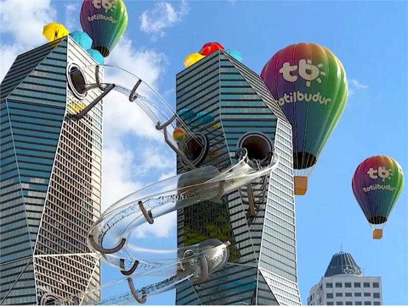 TatilBudur’un Yeni CGI Reklam Kampanyasında Plazaların  Arasından Dev Su Kaydırağı Geçiyor!